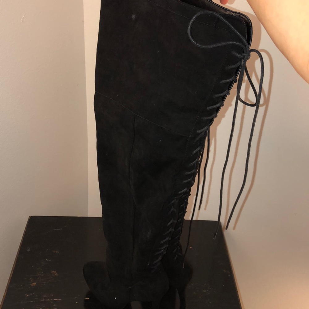 Over the knee high heeled boots